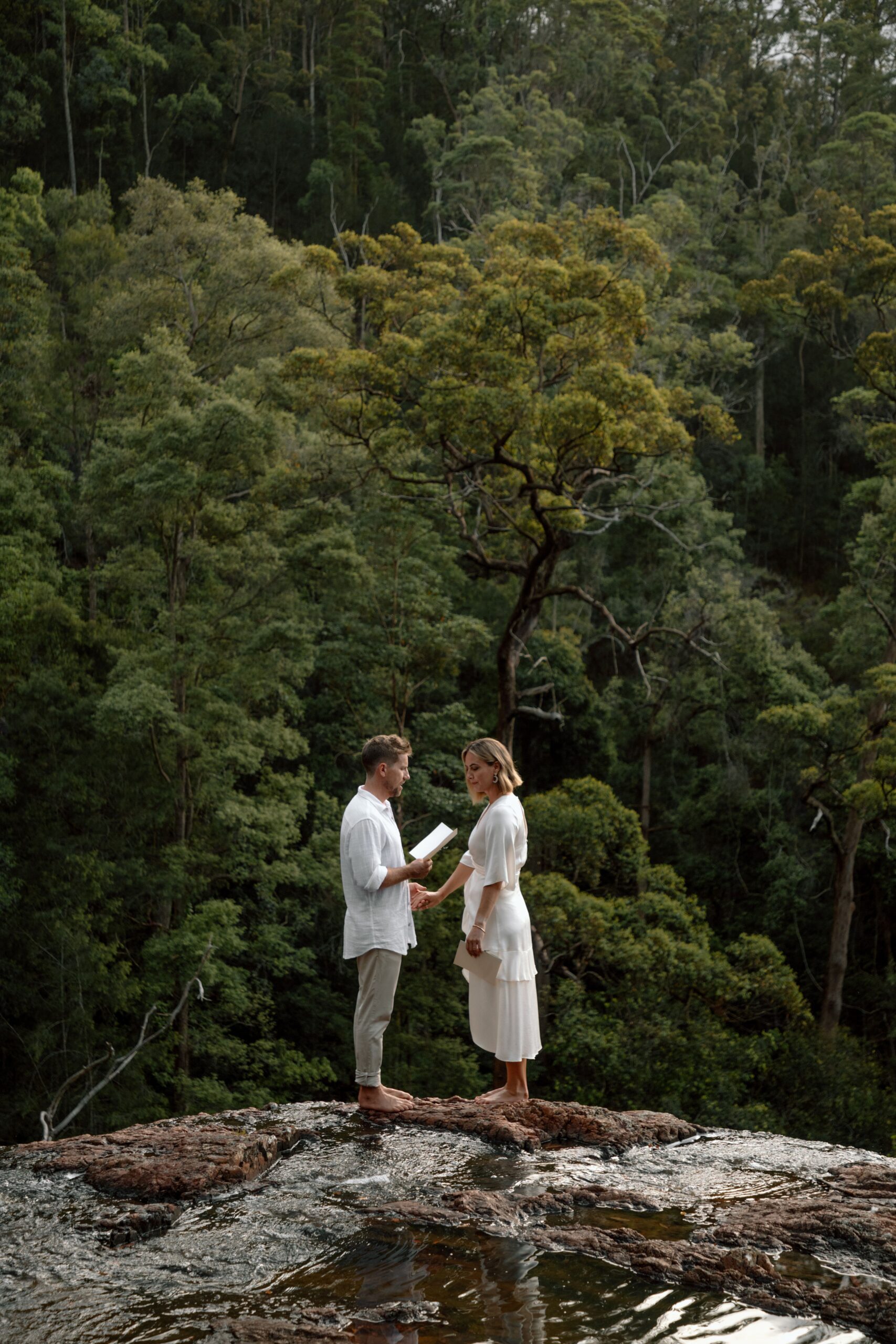 vow renewal on edge of waterfall